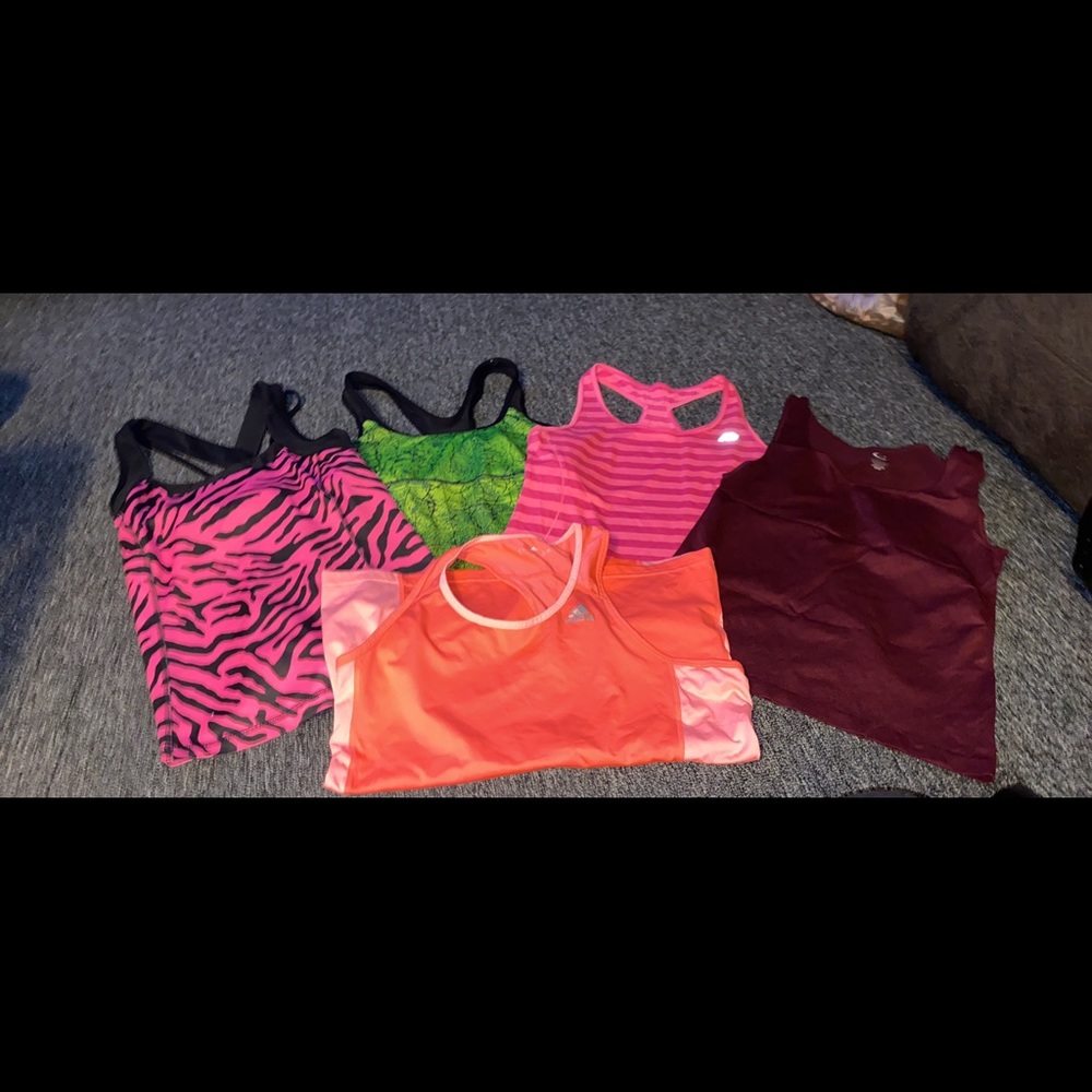 Size medium tanks. 5 tanks for $25